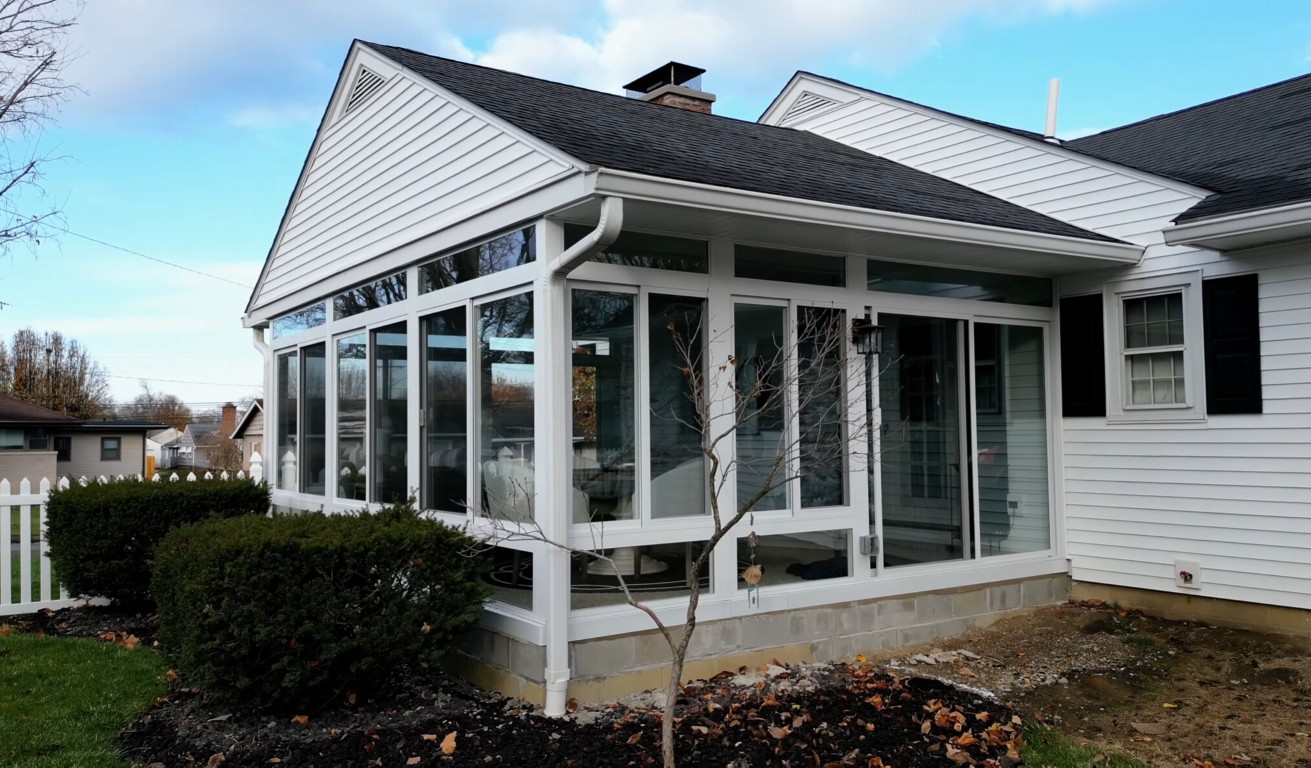 Three-season sunroom with large glass panels installed in Delray Beach, FL